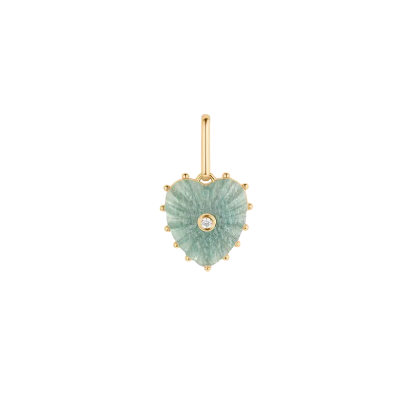 Heart-shaped pendant with green stone and gold accents on a white background