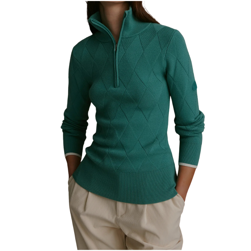Green sweater with diamond pattern worn by a person on a white background