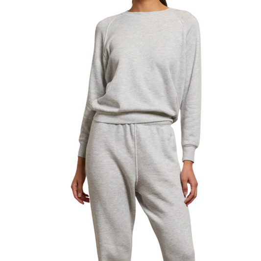 Gray sweatshirt and pants set on a white background