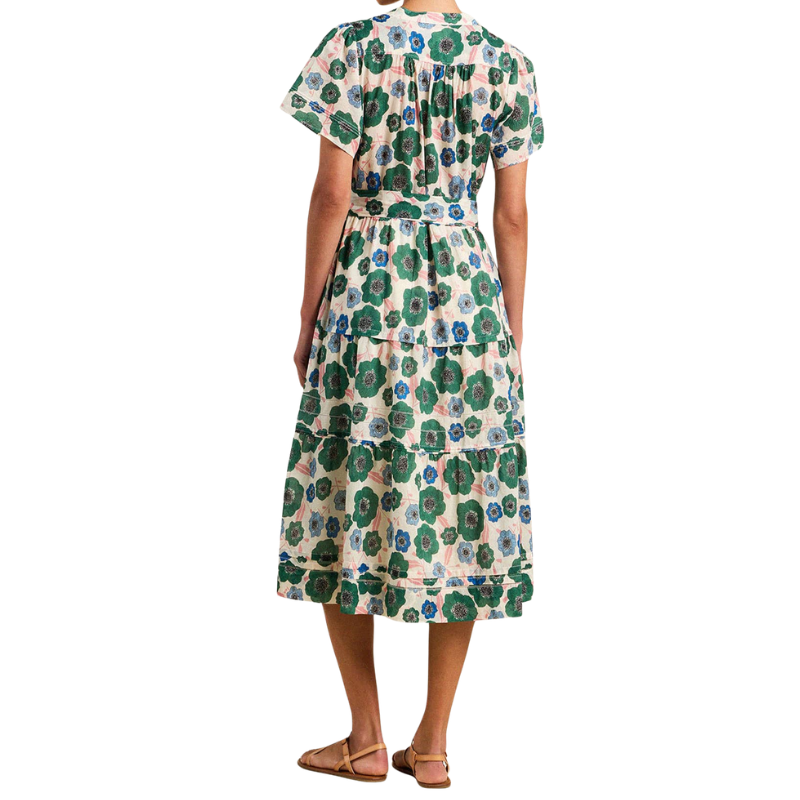 Woman wearing a floral dress on a white background