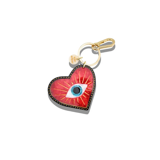 Heart-shaped keychain with eye design on a white background