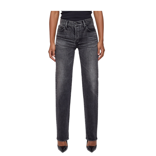 Person wearing black jeans on a white background