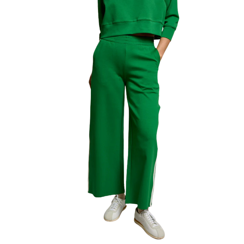 Green outfit with wide-leg pants and a sweatshirt on a white background