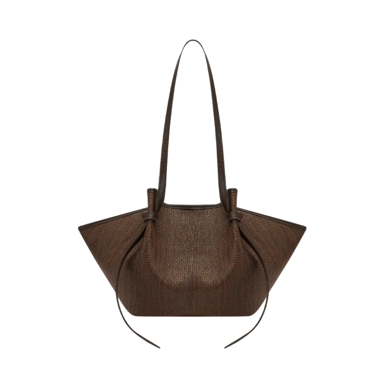 Brown handbag with a strap on a white background