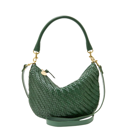 Green woven handbag with gold accents on a white background