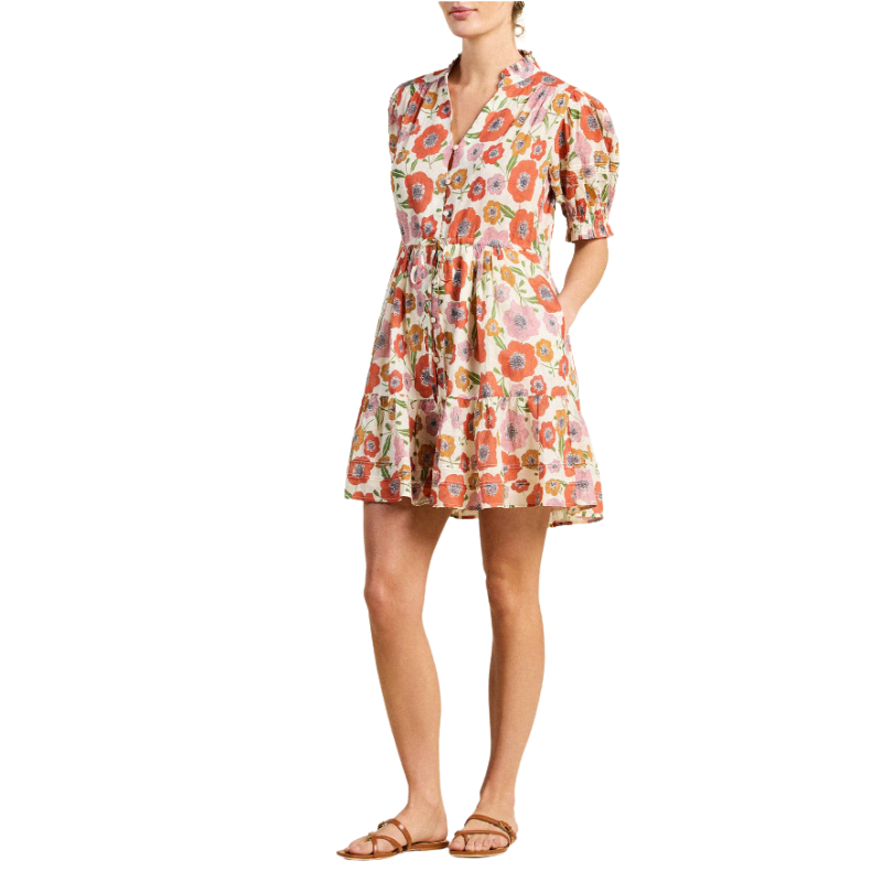 Woman wearing a floral dress on a white background