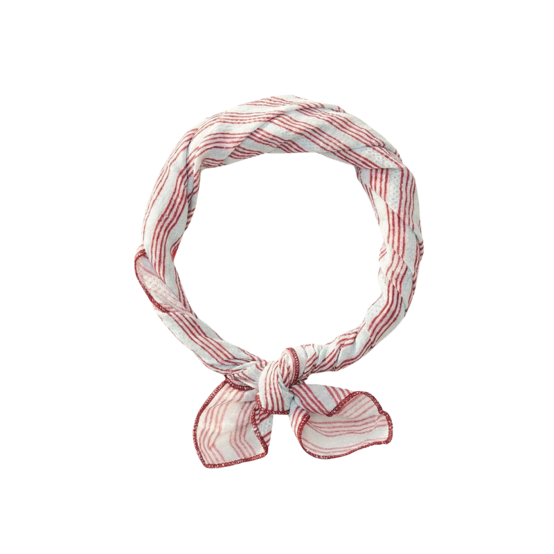 Red and white striped headband on a white background