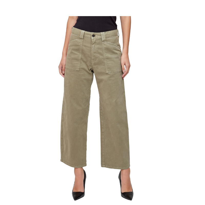 Person wearing beige pants on a white background