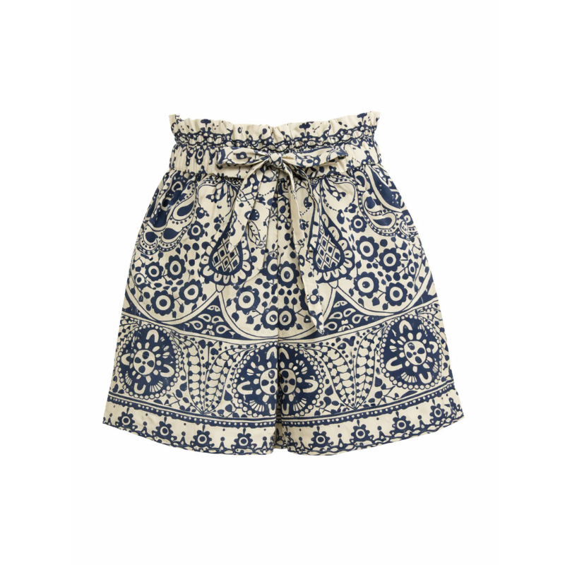 Navy and white patterned shorts on a white background