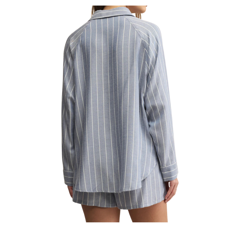 Striped pajama set with shirt and shorts on a white background