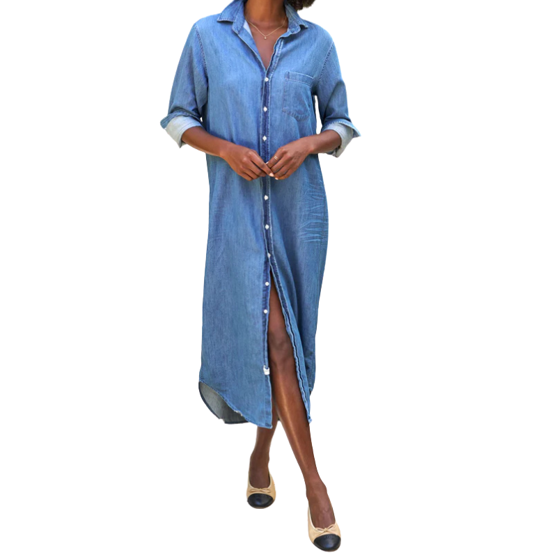 Woman wearing a long blue denim dress on a white background