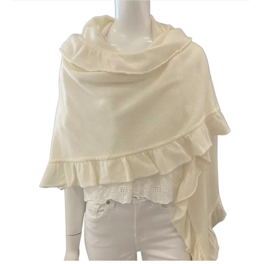 Beige shawl with ruffled edges on a mannequin against a white background