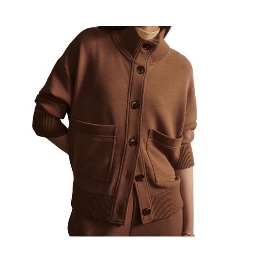 Brown cardigan with button details on a white background
