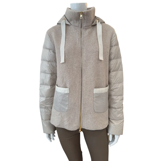 Beige and gray puffer jacket on a mannequin against a white background