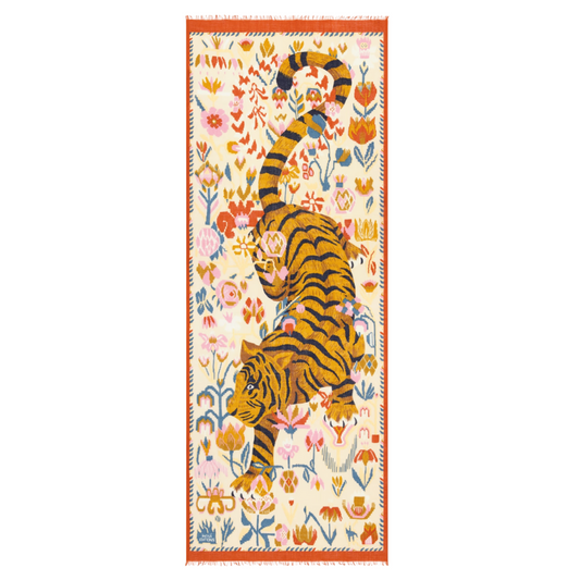 Decorative rug with tiger design on a white background