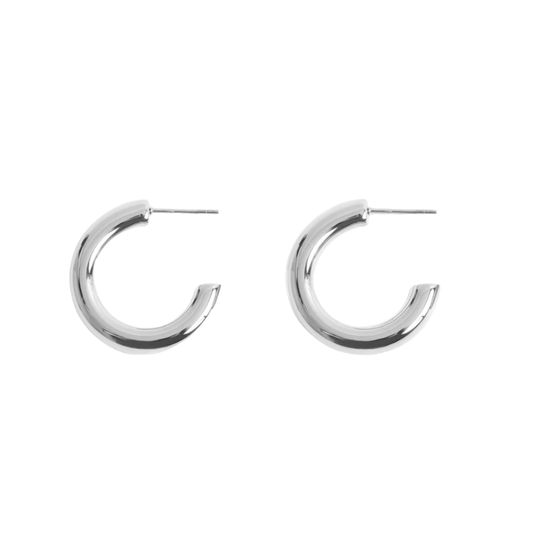 Pair of silver hoop earrings on a white background