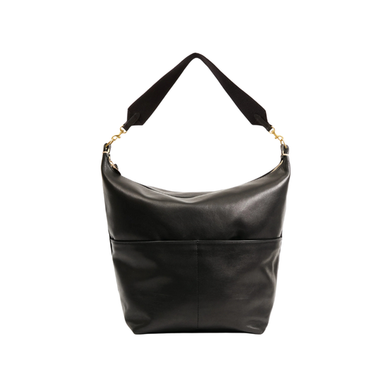 Black leather handbag with a strap on a white background