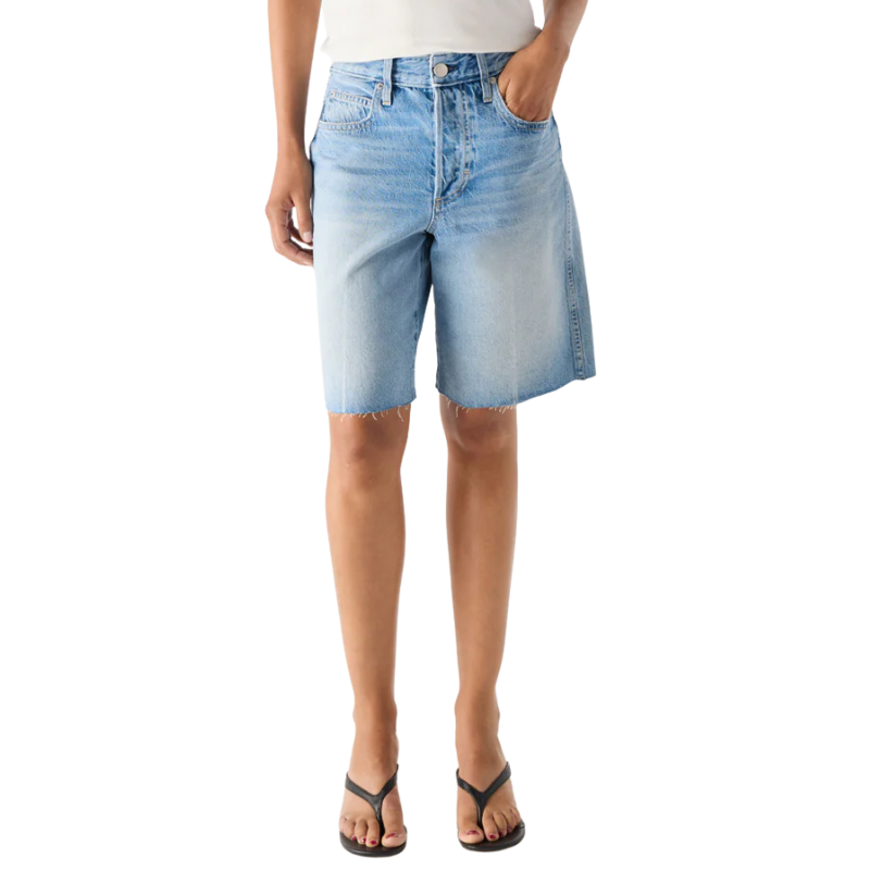 Light blue denim shorts worn by a person on a white background