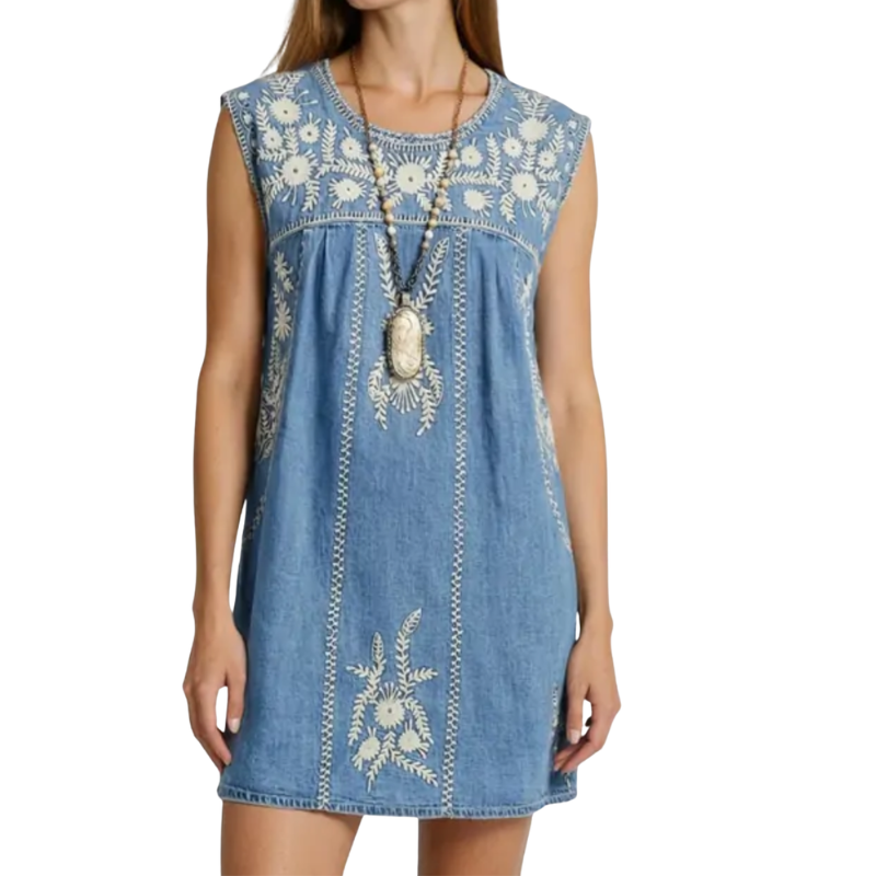 Denim dress with floral embroidery on a white background