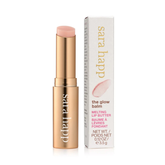 Lip balm with gold casing and 'sarah happ' branding on a white background