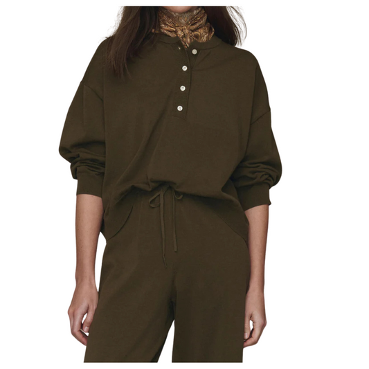 Brown outfit with a matching top and pants on a white background