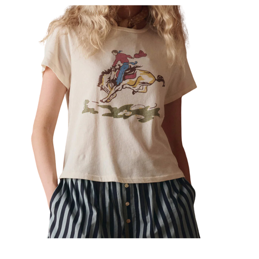 Person wearing a t-shirt with a graphic design of a person on a horse.