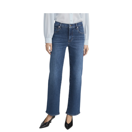 Blue jeans worn by a person on a white background