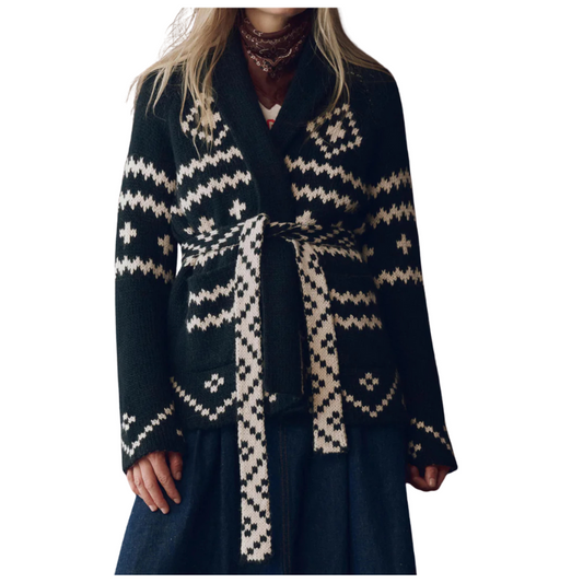Navy blue coat with white geometric pattern worn by a person on a white background