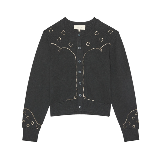 Black cardigan with decorative buttons and patterns on a white background