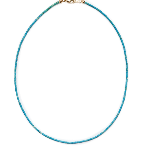 Turquoise beaded necklace on a white background