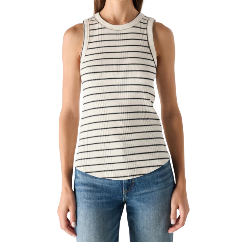 Person wearing a striped sleeveless top and jeans on a white background