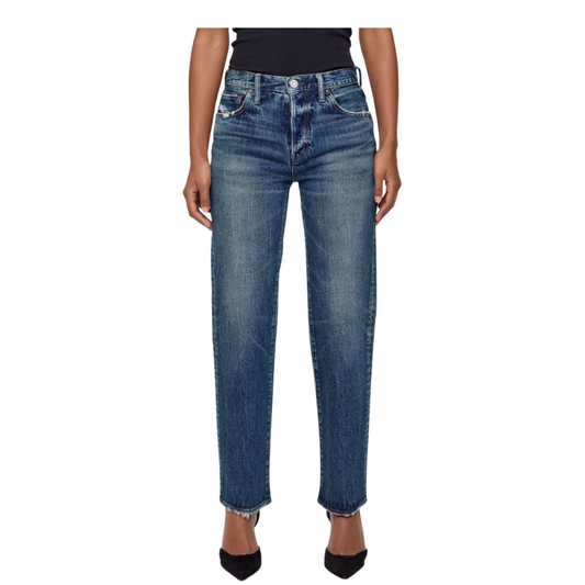 Blue jeans worn by a person on a white background