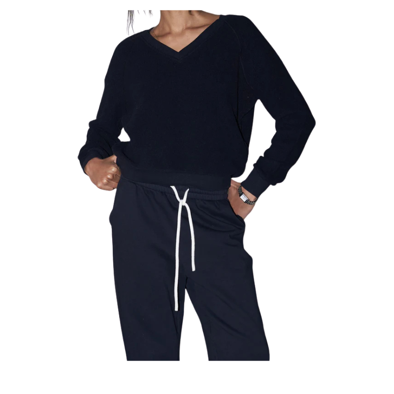 Black long-sleeve top and pants with white drawstring on a white background